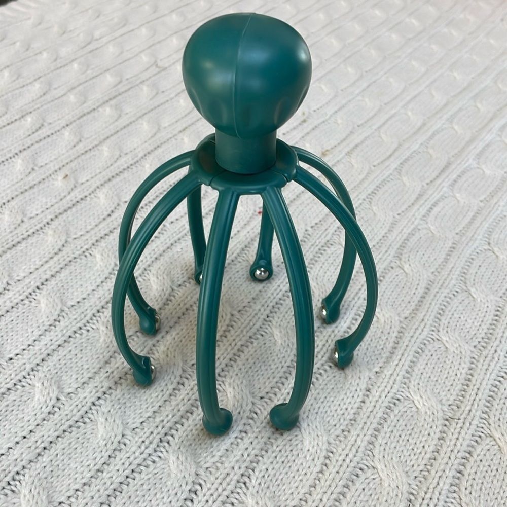 Scalp massager gently massages pressure points and sensitive nerves on head/neck